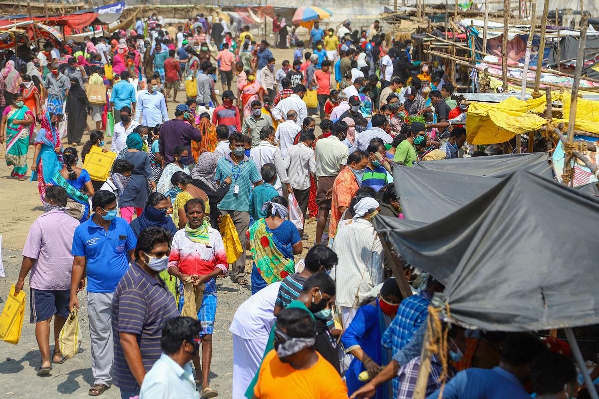 Huge crowd is seen to buy vegetables and groceries at a market, during a nationwide lockdown in the wake of coronavirus pandemic, in Chennai, Saturday, April 25, 2020. Credit: PTI Photo