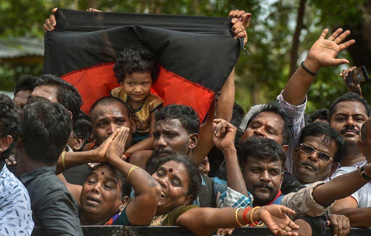 DMK workers mourn the death of their Party chief M Karunanidhi at Rajaji Hall, in Chennai on Wednesday, Aug. 08, 2018. Karunanidhi died yesterday after a prolonged illness. PTI Photo