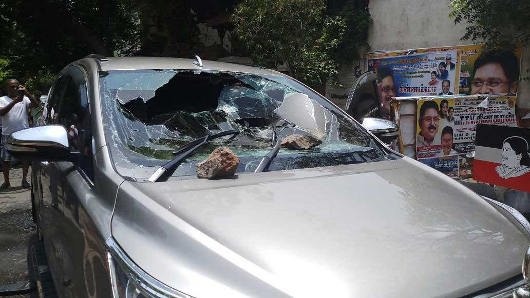   Police sources said Parimalam and his supporters hurled bombs towards his car in which four persons, including those working at Dhinakaran’s house, were injured. DH Photo