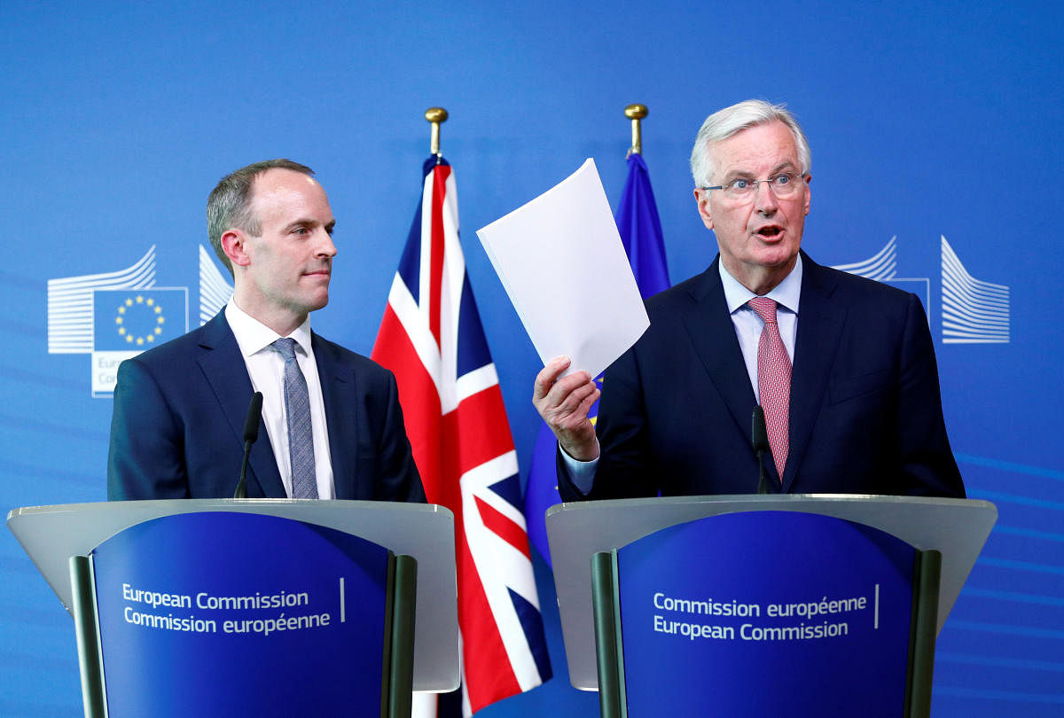 Britain's Secretary of State for Exiting the European Union, Dominic Raab and European Union's chief Brexit negotiator, Michel Barnier, talk to the media ahead of a meeting in Brussels. Reuters file photo.