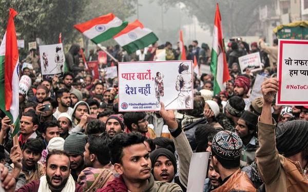 Protestors raise slogans during an anti-Citizenship Act protest, at Sunehri Masjid, Daryaganj, in New Delhi, Thursday, Dec. 19, 2019. (PTI Photo)