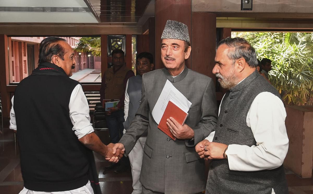 Senior Congress leader Ghulam Nabi Azad and Anand Sharma and MDMK leader Vaiko after attending an all party meeting ahead of the winter session of Parliament, at Parliament Library Building in New Delhi on Sunday. (PTI Photo)