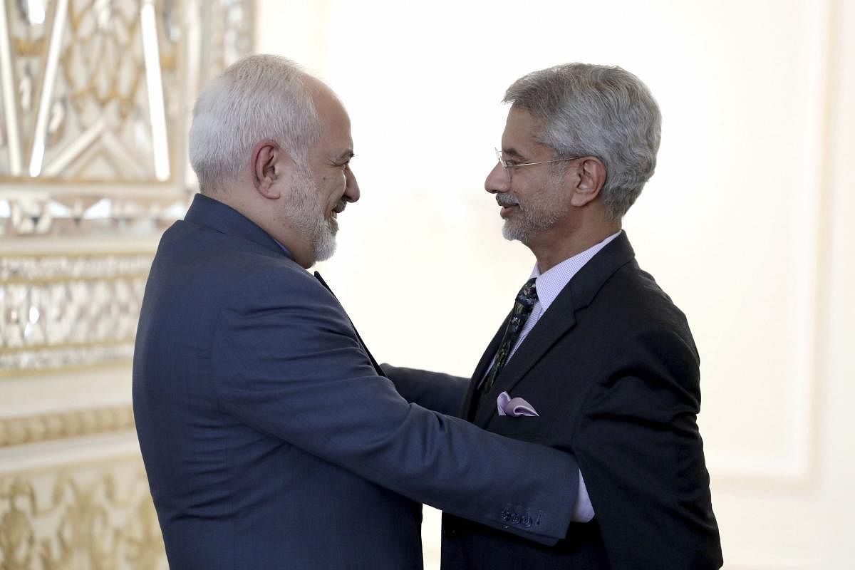 Iranian Foreign Minister Mohammad Javad Zarif, left, welcomes his Indian counterpart, Subrahmanyam Jaishankar, for their meeting in Tehran. (AP/PTI photo)