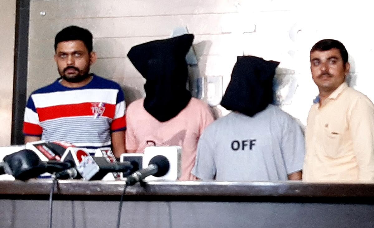 Two suspected persons, Sheikh Ashfaq Hussain and Pathan Moinuddin Ahmed, arrested in connection to the murder of Hindu Samaj Party founder Kamlesh Tiwari arrested from Gujarat-Rajasthan border near Shamlaji, Tuesday, Oct. 22, 2019. (PTI Photo)