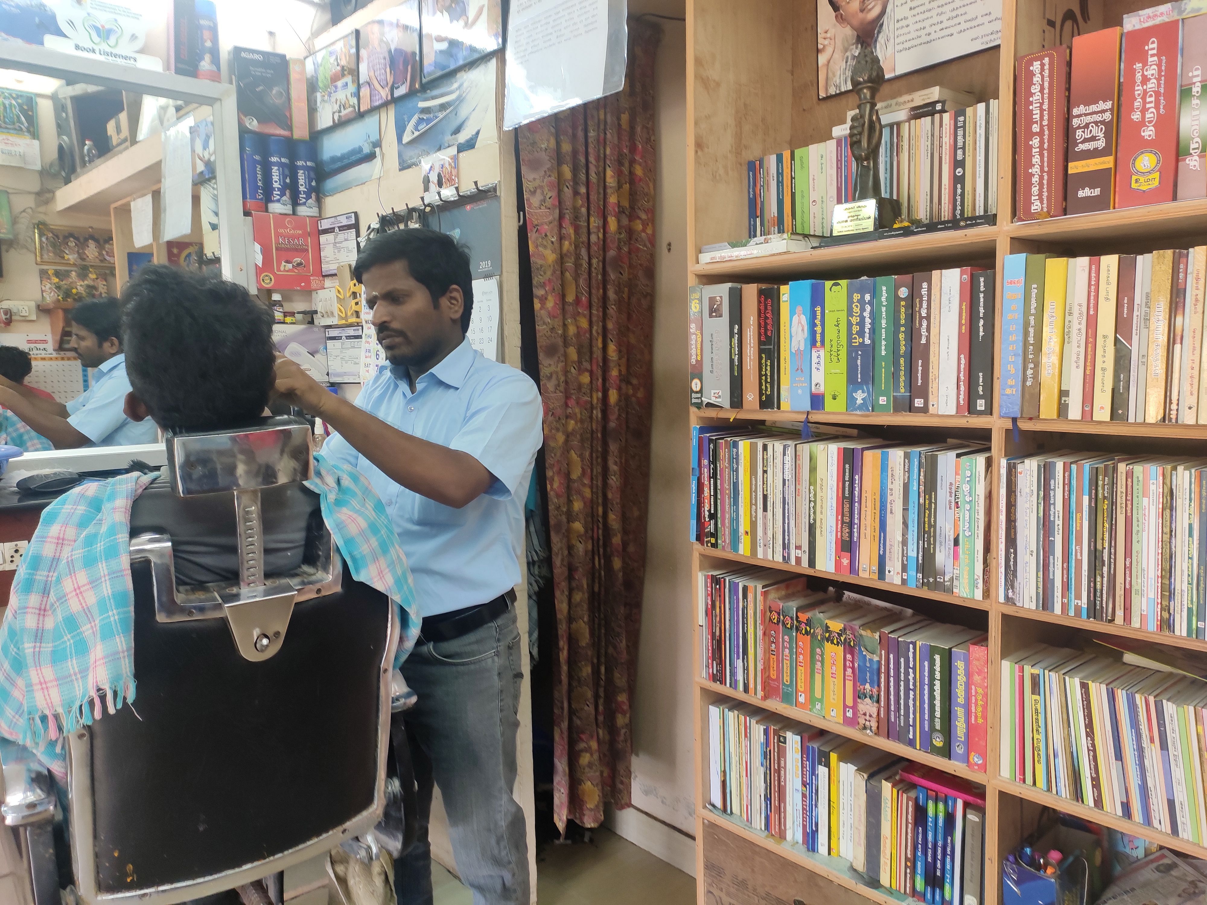 The tiny room is nothing but a salon with a difference. It has a mini-library and customers get a discount of Rs 30 if they spend more than 30 minutes reading a book from the huge collection. DH Photo