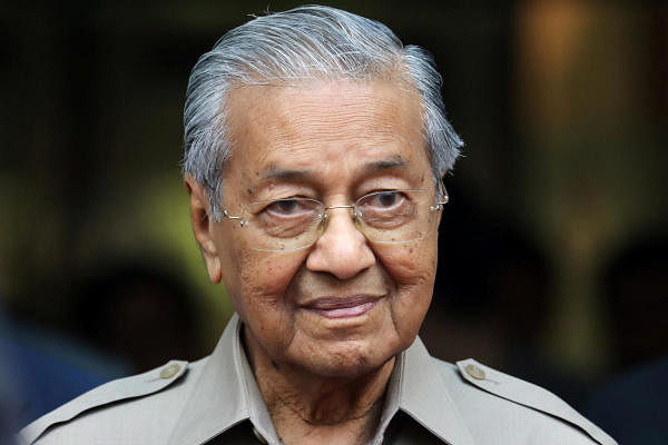 Malaysia's Interim Prime Minister Mahathir Mohamad leaves after an event in Kuala Lumpur. (Reuters Photo)