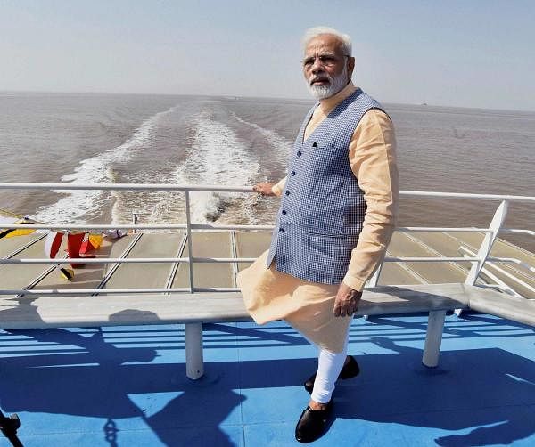 Prime Minister Narendra Modi on the maiden voyage of Ro-Ro Ferry Service between Ghogha and Dahej, after its inauguration in Ghogha, Bhavnagar, Gujarat on Sunday. (PTI Photo)