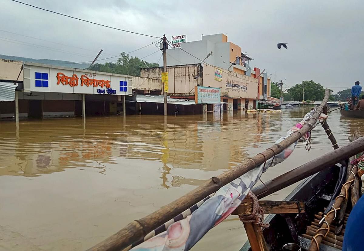  A view of buildings submerged in flood waters following heavy monsoon rainfall, in Neemuch district of Madhya Pradesh, Sunday, Sept. 15, 2019. (PTI Photo)