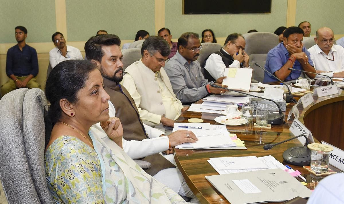  Union Finance Minister Nirmala Sitharaman, MoS in the Ministry of Finance Anurag Thakur and others attend a pre-budget meeting (PTI File Photo)