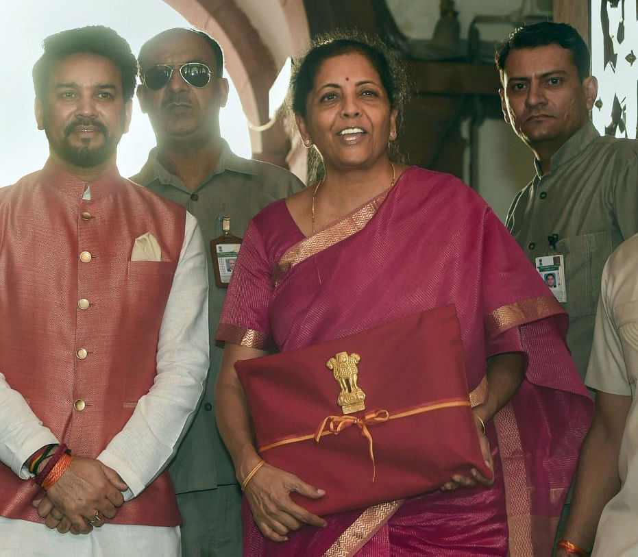 Finance Minister Nirmala Sitharaman and MoS Anurag Thakur arrive at Parliament to present the Union Budget 2019-20, in New Delhi, Friday, July 05, 2019. PTI Photo