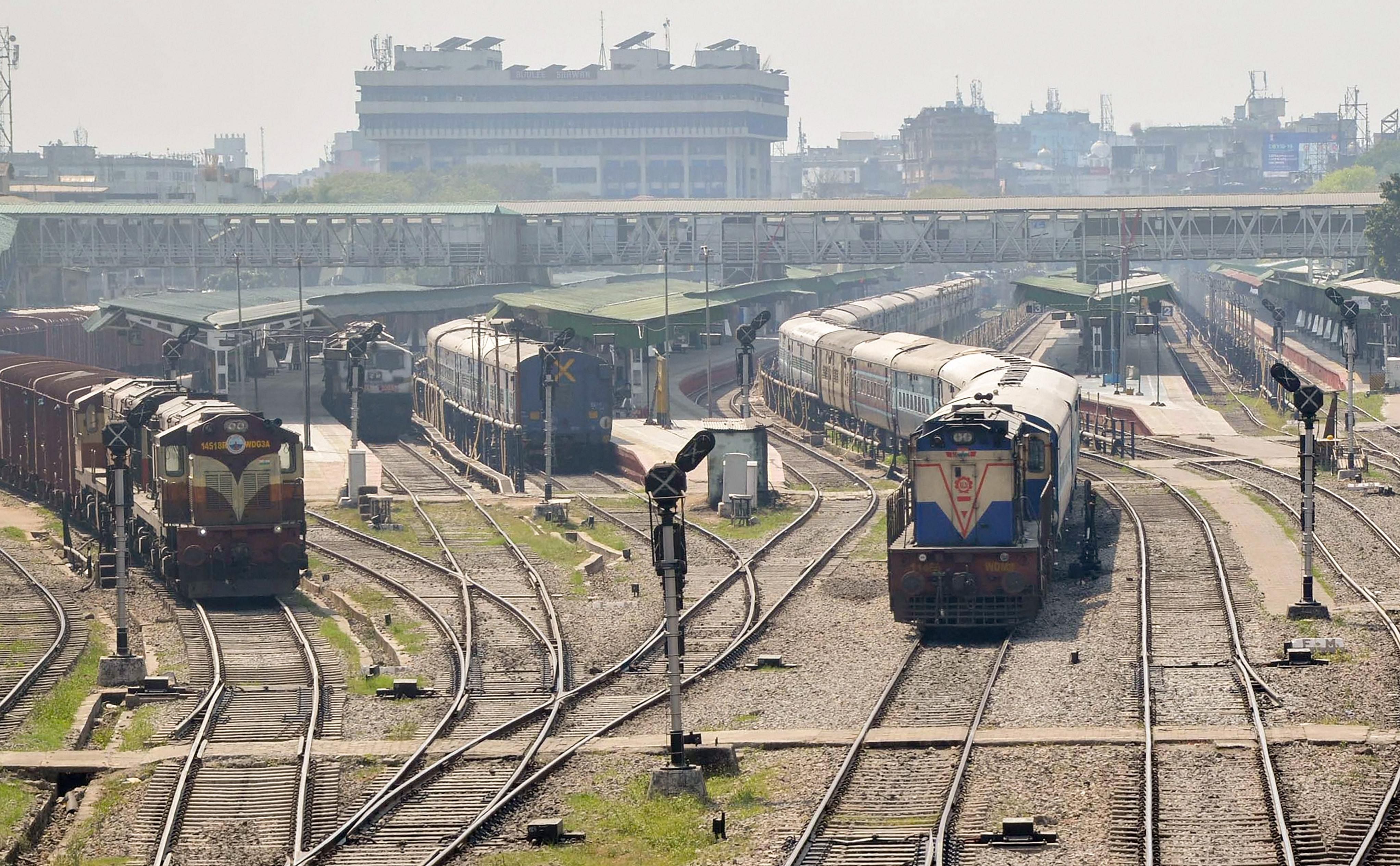 Trains parked at a deserted railway station during the nationwide lockdown in Guwahati. (Credit: PTI)