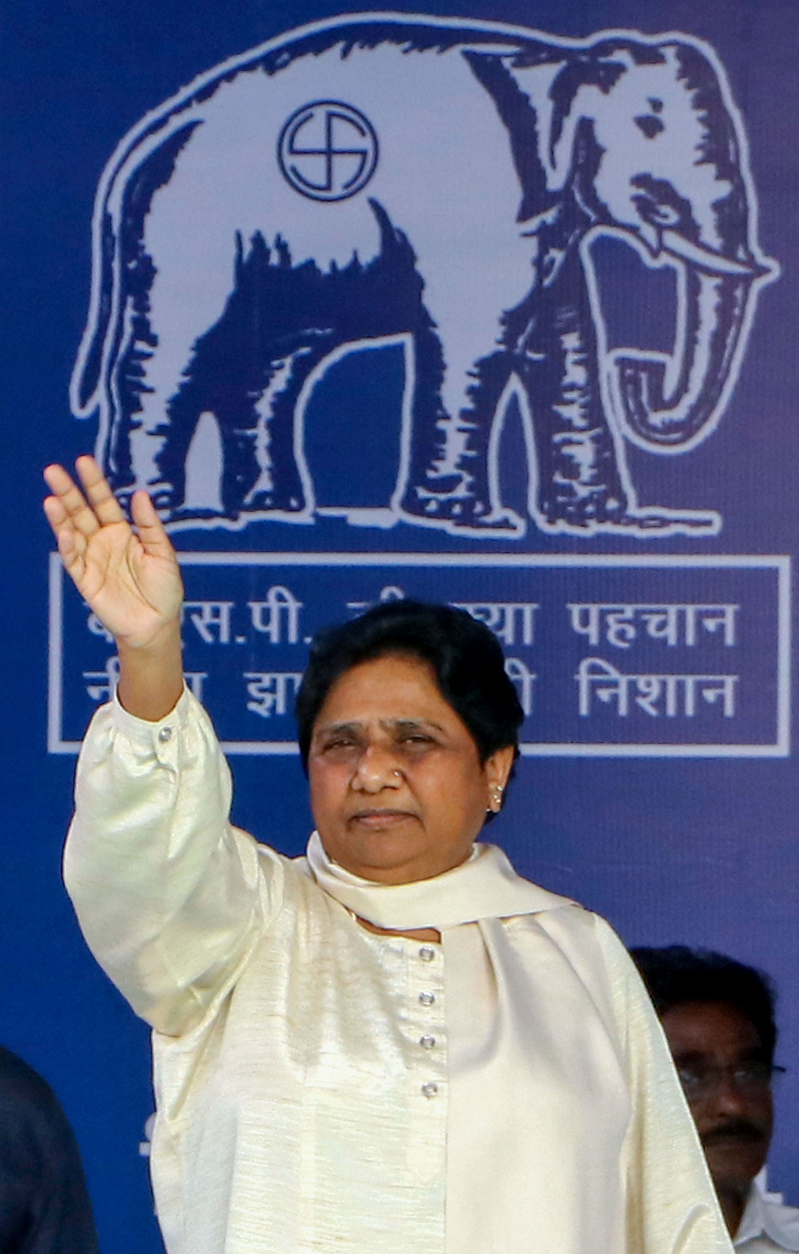BSP supremo Mayawati waves at party workers at an election campaign rally in support of party candidates ahead of Maharashtra Assembly polls, in Nagpur. (PTI Photo)