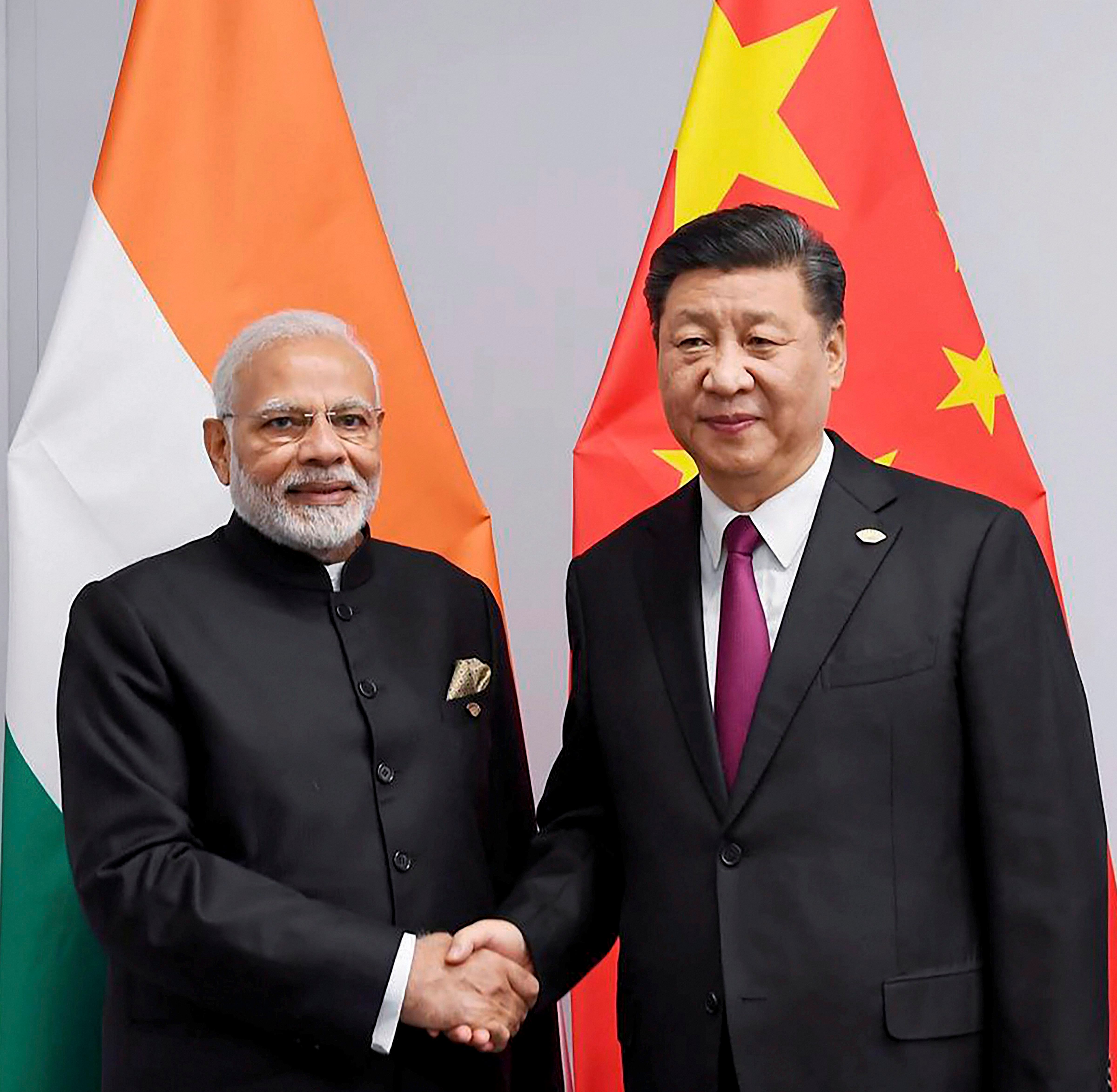 Prime Minister Narendra Modi shakes hands with Chinese President Xi JinpingPrime Minister Narendra Modi shakes hands with Chinese President Xi Jinping. (PTI Photo)