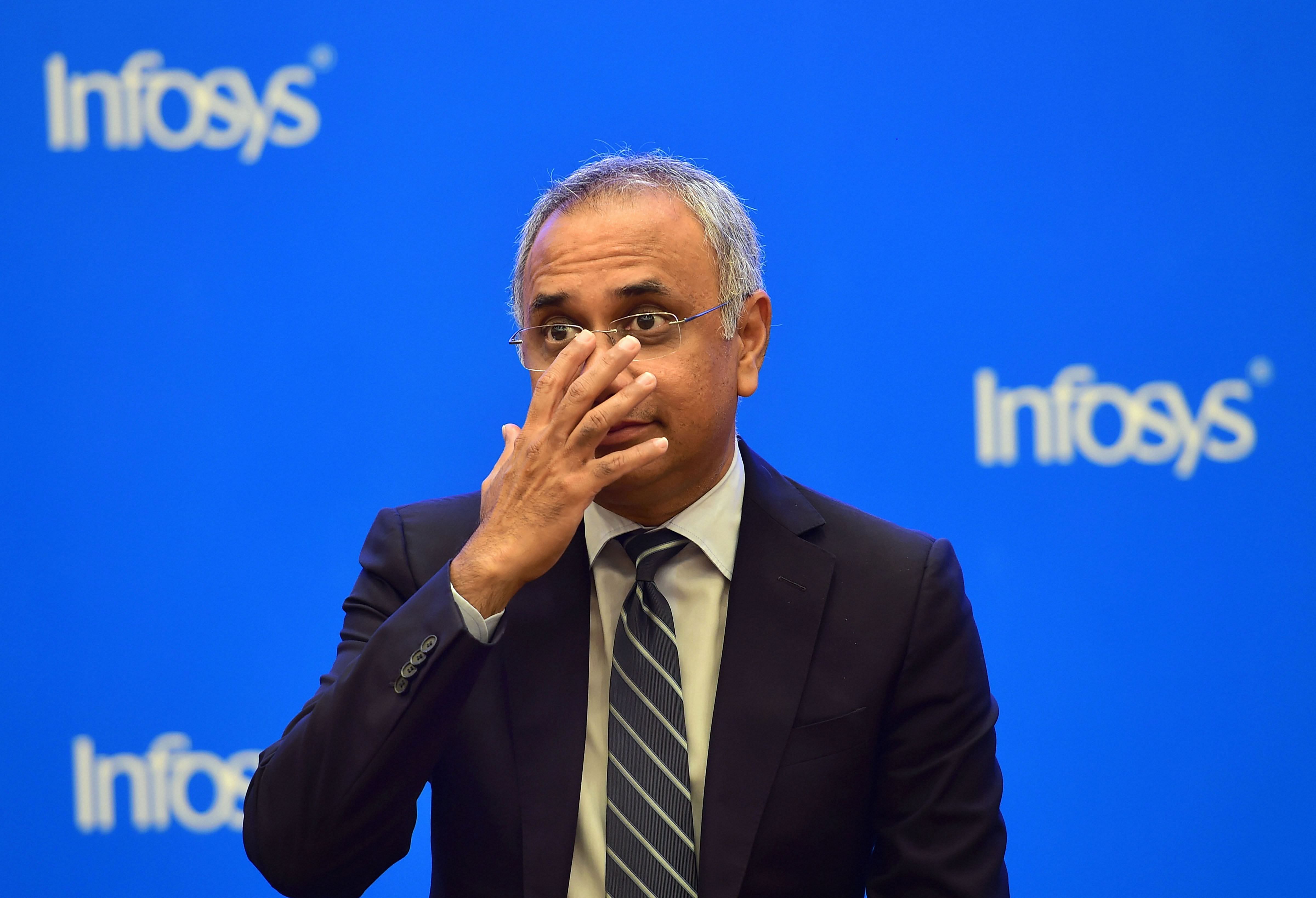  Infosys CEO Salil Parekh gestures during a press conference to announce the company's third quarter results in Bengaluru. (PTI Photo)