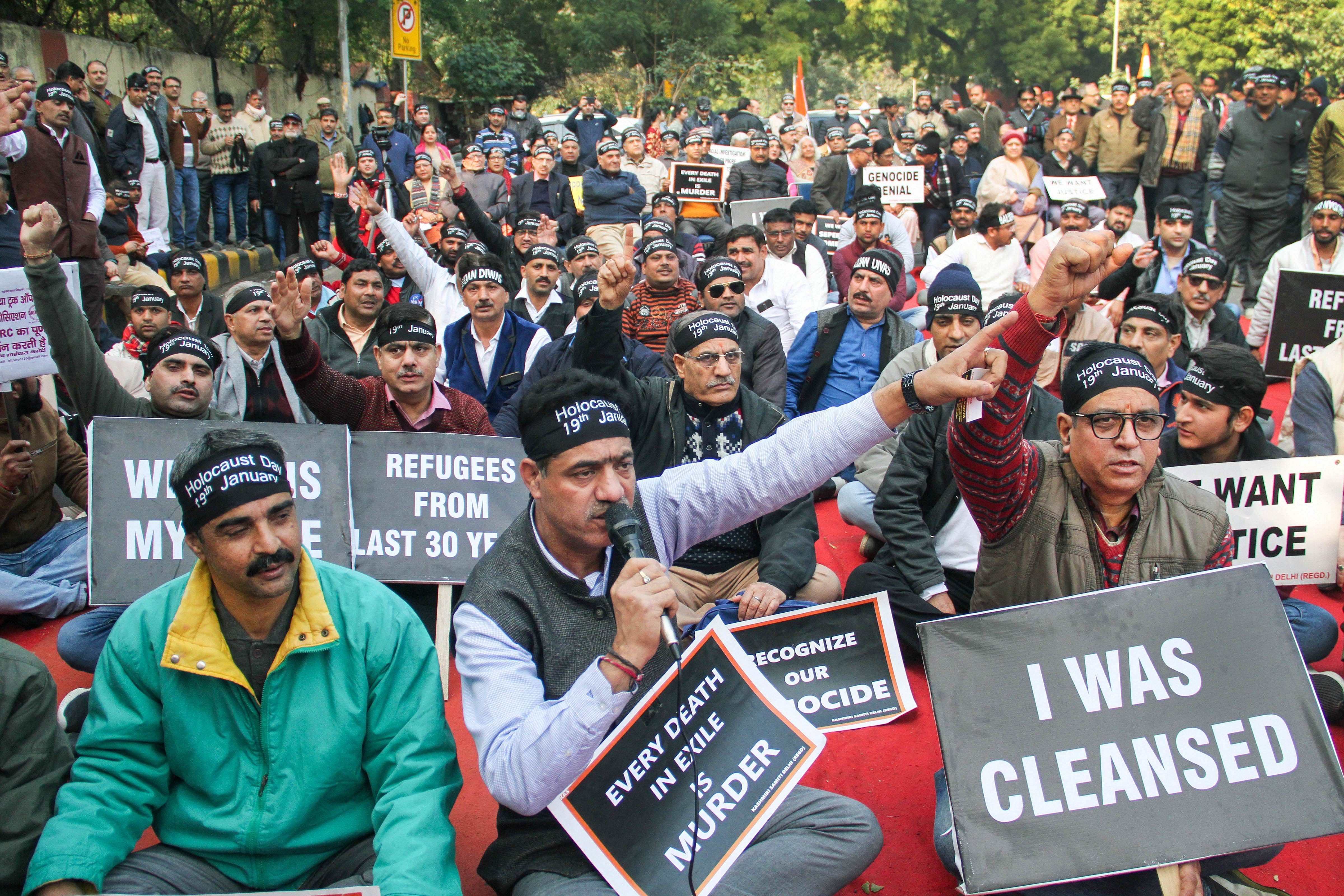 Kashmiri Pandits take part in a demonstration in support of the Citizenship Amendment Act at Jantar Mantar in New Delhi. (PTI Photo)
