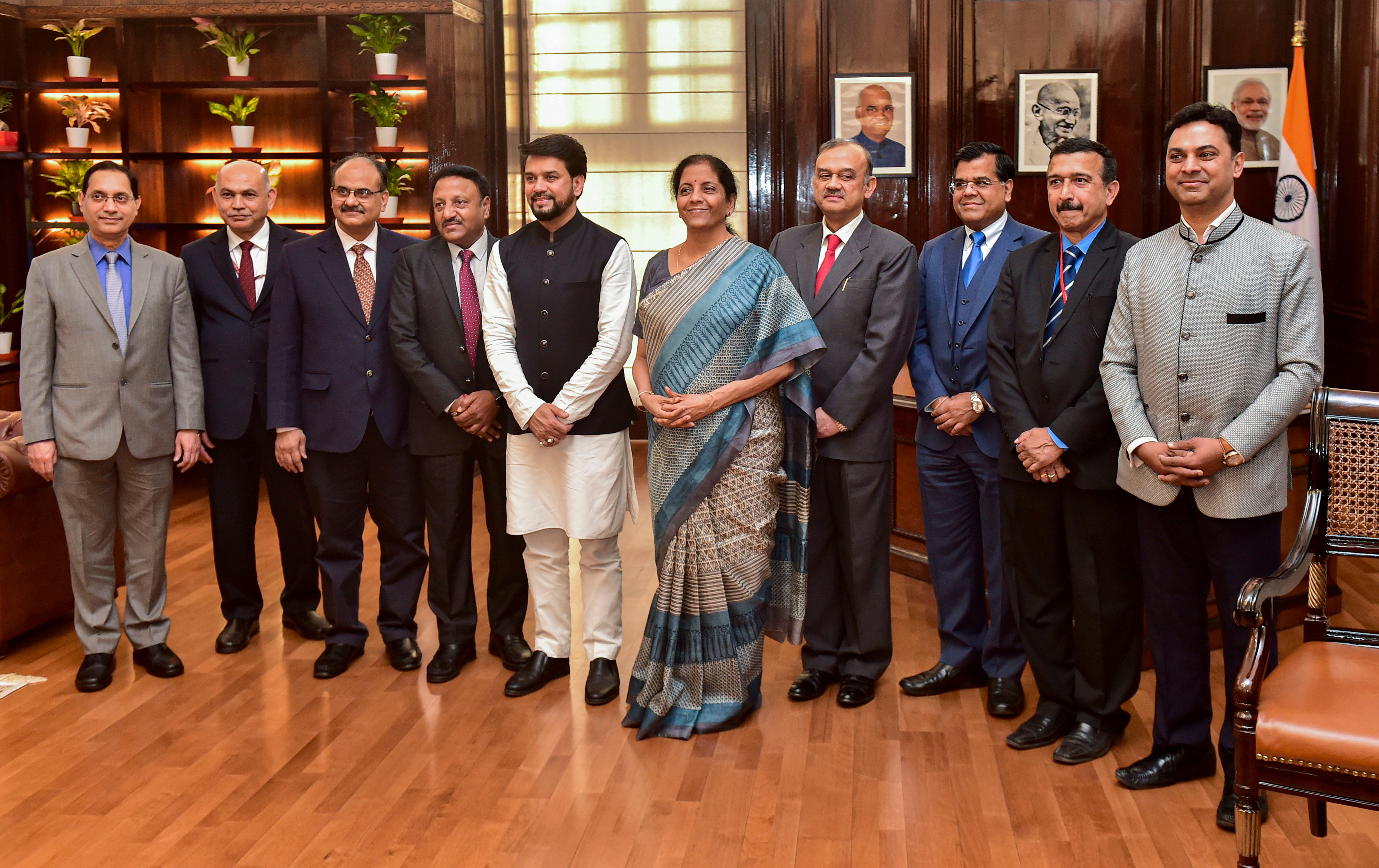 Union Finance Minister Nirmala Sitharaman, MoS Finance Anurag Thakur and finance ministry officials pose for a photograph after giving final touches to the Union Budget 2020-21, at Finance Ministry, in New Delhi. (PTI Photo)