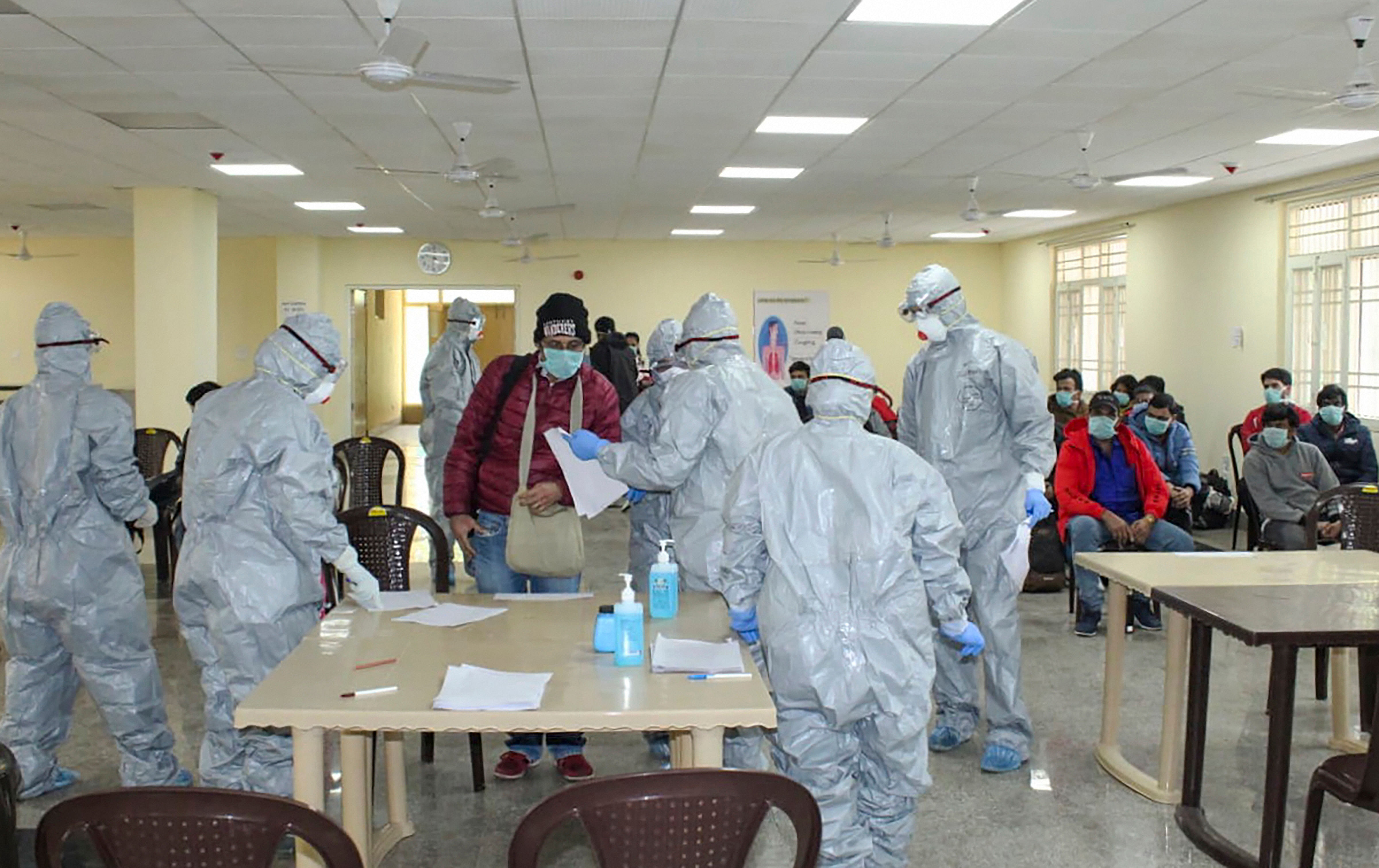 Samples for virus testing being collected at AIIMS hospital, Delhi. (PTI photo)