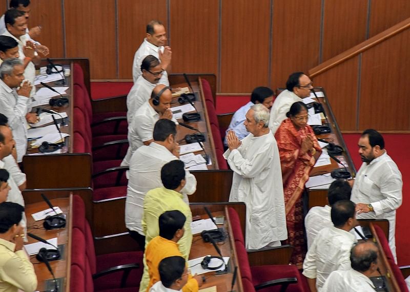 Odisha Chief Minister Naveen Pattnaik greets the members on the first day of the Budget Session of Assembly. (PTI Photo)