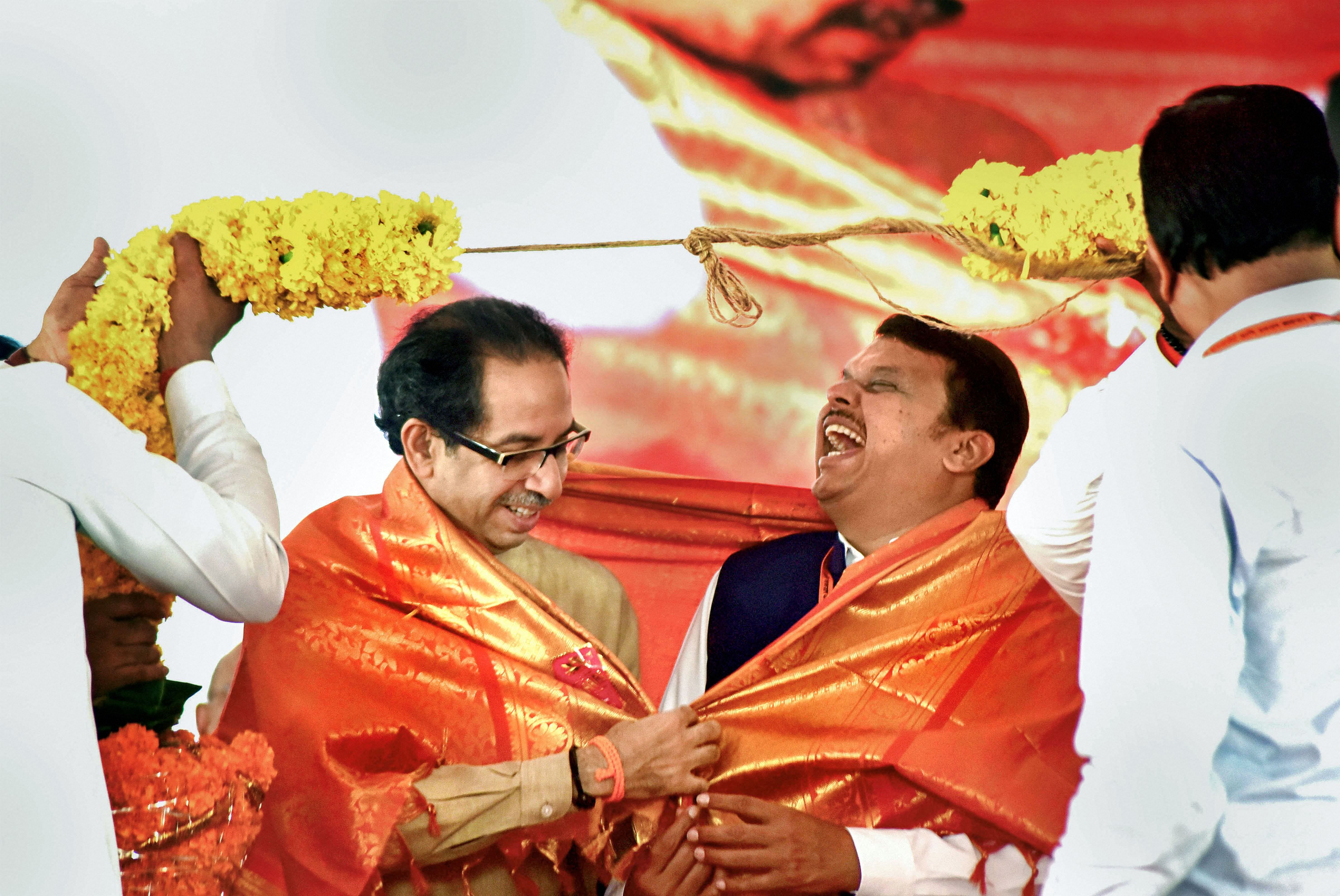 Shiv Sena Party President Uddhav Thackeray and Maharashtra Chief Minister Devendra Fadnavis. (PTI Photo)