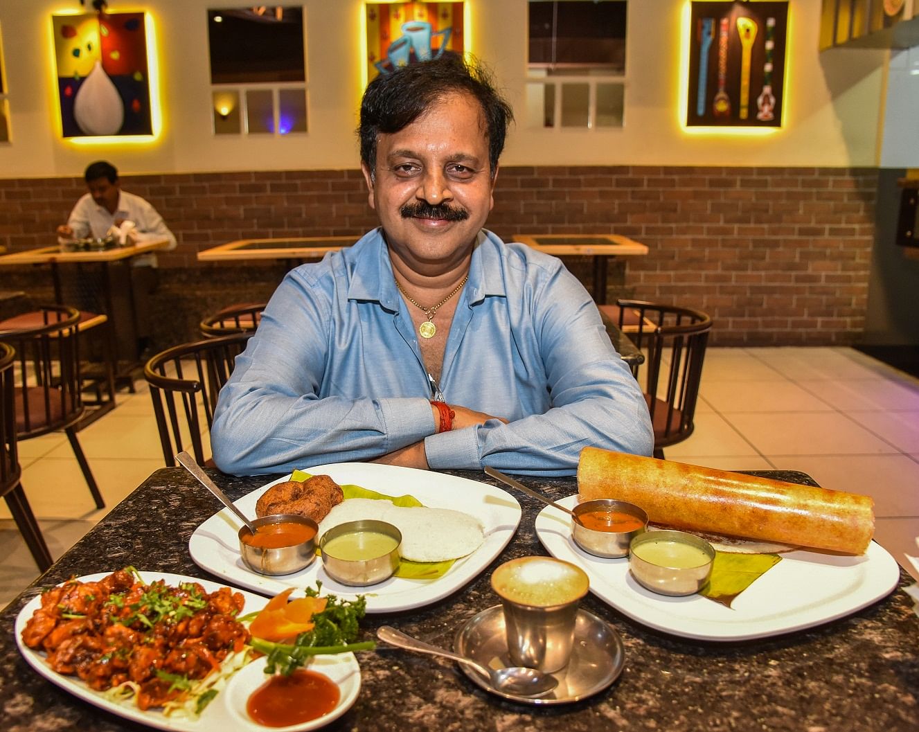 K N Vasudeva Adiga now runs the Paakashala restaurant chain. 