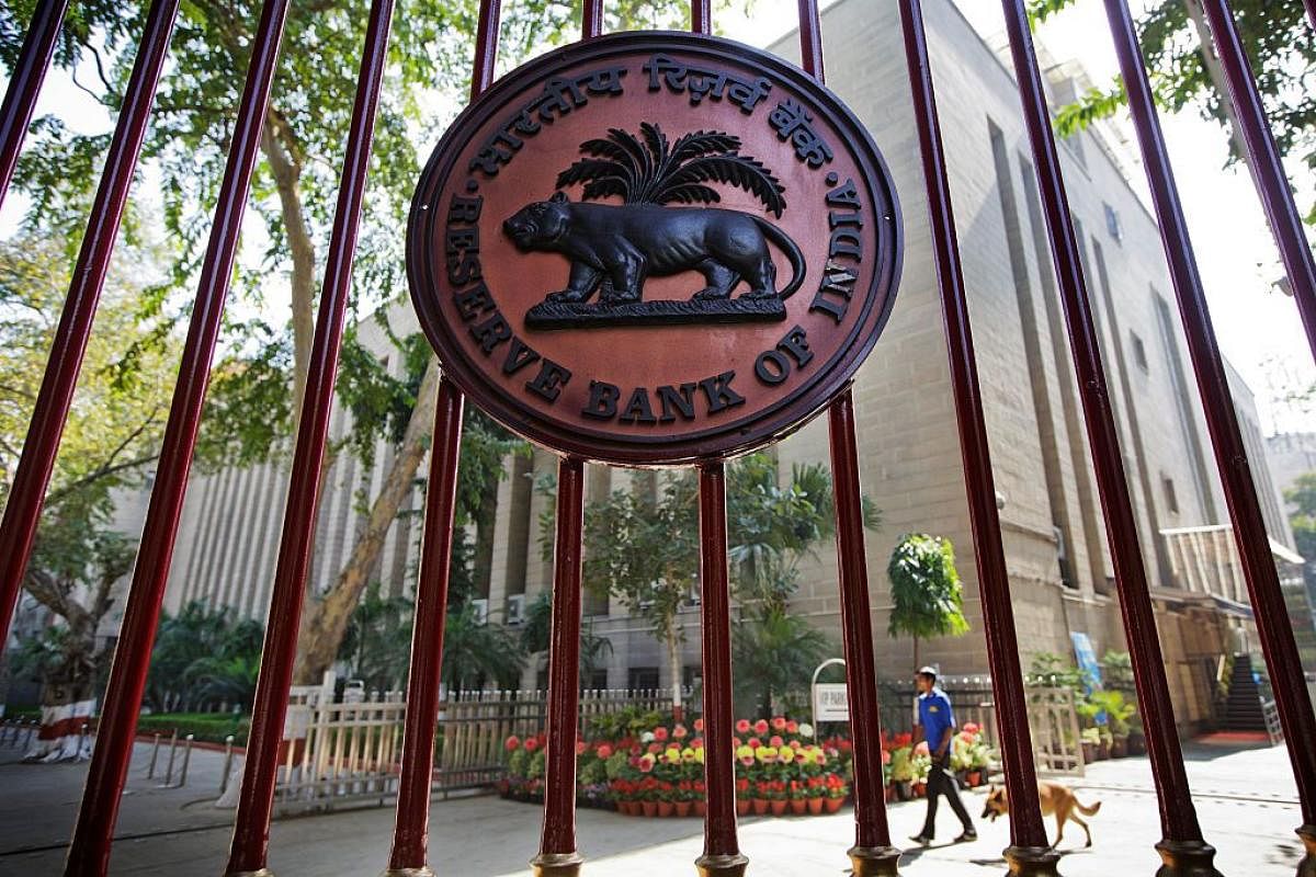 The Reserve Bank of India (RBI) logo is displayed on a gate at the central bank's headquarters in New Delhi, India. Credit: Bloomberg Photo