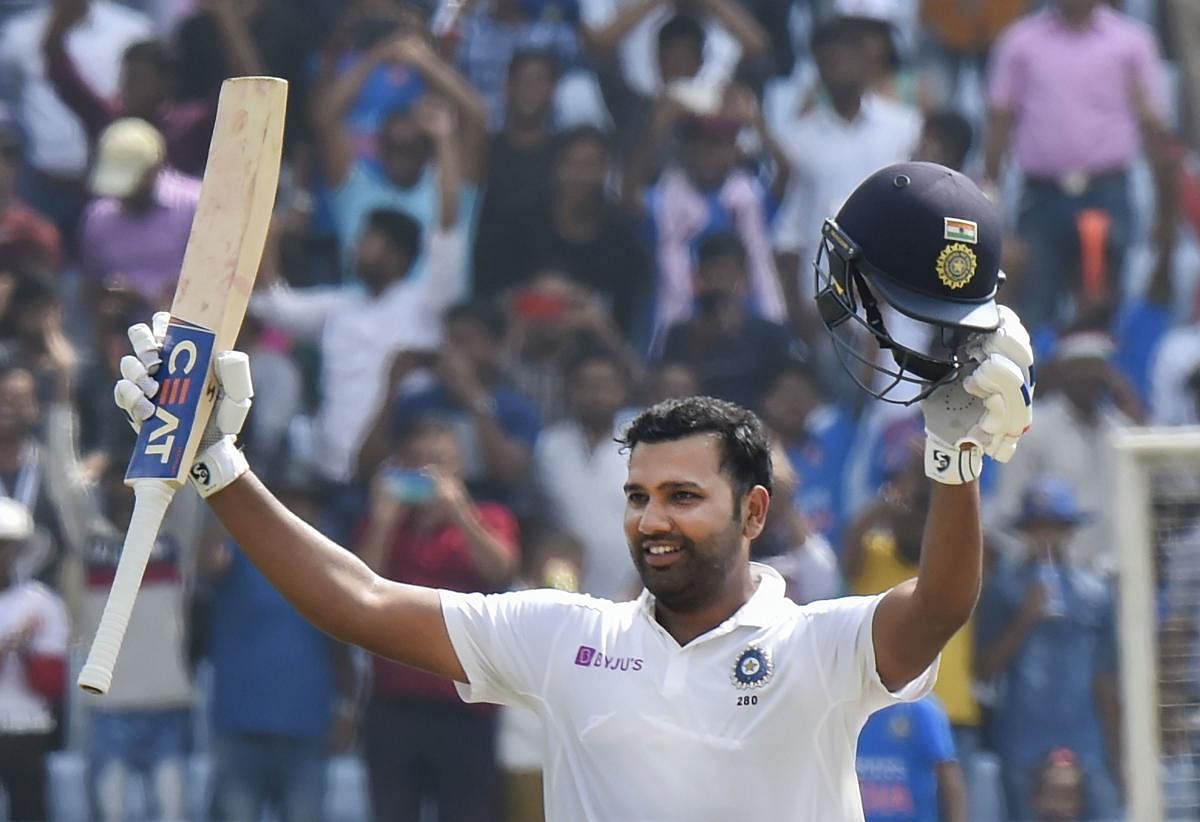  India's Rohit Sharma celebrates his double century during 2nd day of the 3rd cricket test match against South Africa at JSCA Stadium in Ranchi. PTI file photo
