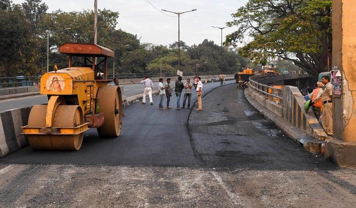 Non-payment of dues to the contractor has delayed works on the Sirsi Circle flyover, resulting in traffic woes.