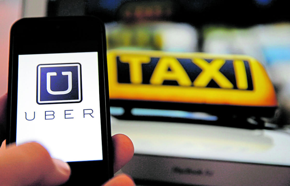 An illustration picture shows the logo of car-sharing service app Uber (Reuters Photo)