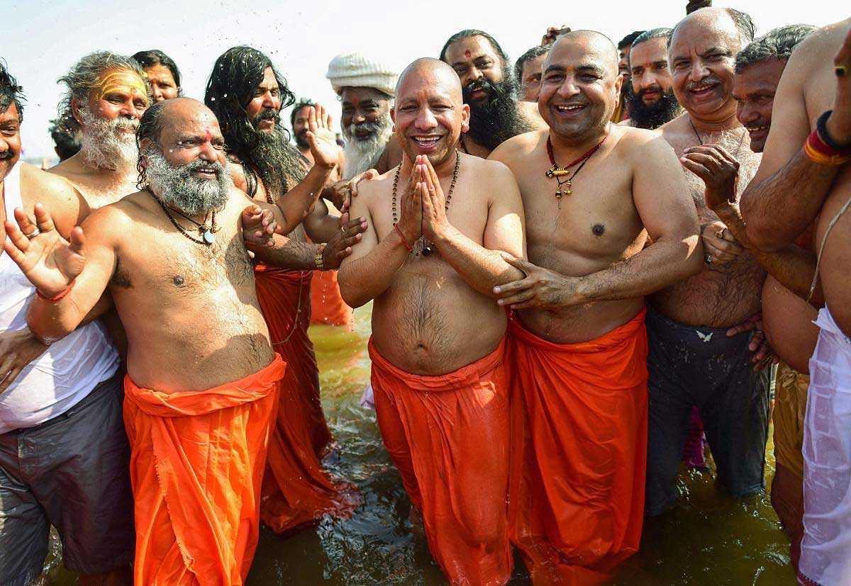  Uttar Pradesh Chief Minister Yogi Adityanath takes a holy dip in the water of River Ganga at Sangam during the ongoing Kumbh Mela-2019, in Allahabad, Tuesday, Jan. 29, 2019. (PTI Photo)