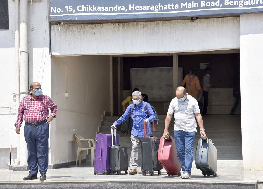 International travellers leave the hospital after testing negative for COVID-19. Credit: DH Photo
