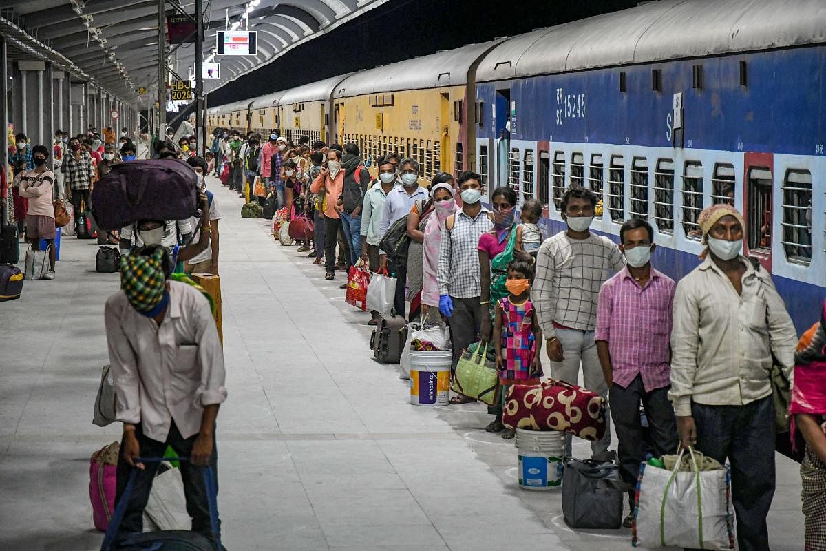  Migrants arrive at a railway station via special trains arranged for them from Telangana, during the ongoing COVID-19 nationwide lockdown, in Bhopal, Wednesday, May 6, 2020. (PTI Photo)