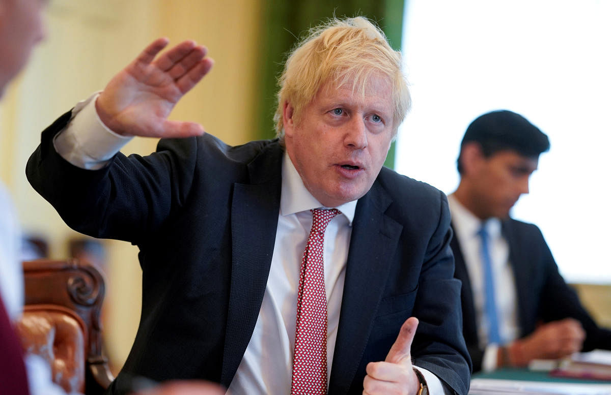 Britain's Prime Minister Boris Johnson chairs a meeting to update on the coronavirus disease (COVID-19), at 10 Downing Street in London. Reuters