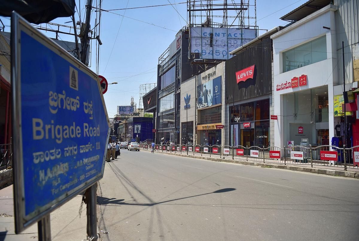 A deserted view of Brigade Road as the government announced the closure of malls, pubs and theatres in the wake of novel coronavirus pandemic, in Bengaluru, Saturday, March. 14, 2020. (PTI Photo)
