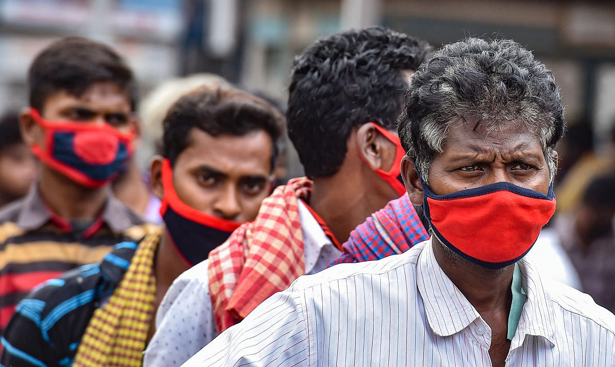 People wear facemask as a measure to prevent from COVID-19 (PTI Photo)