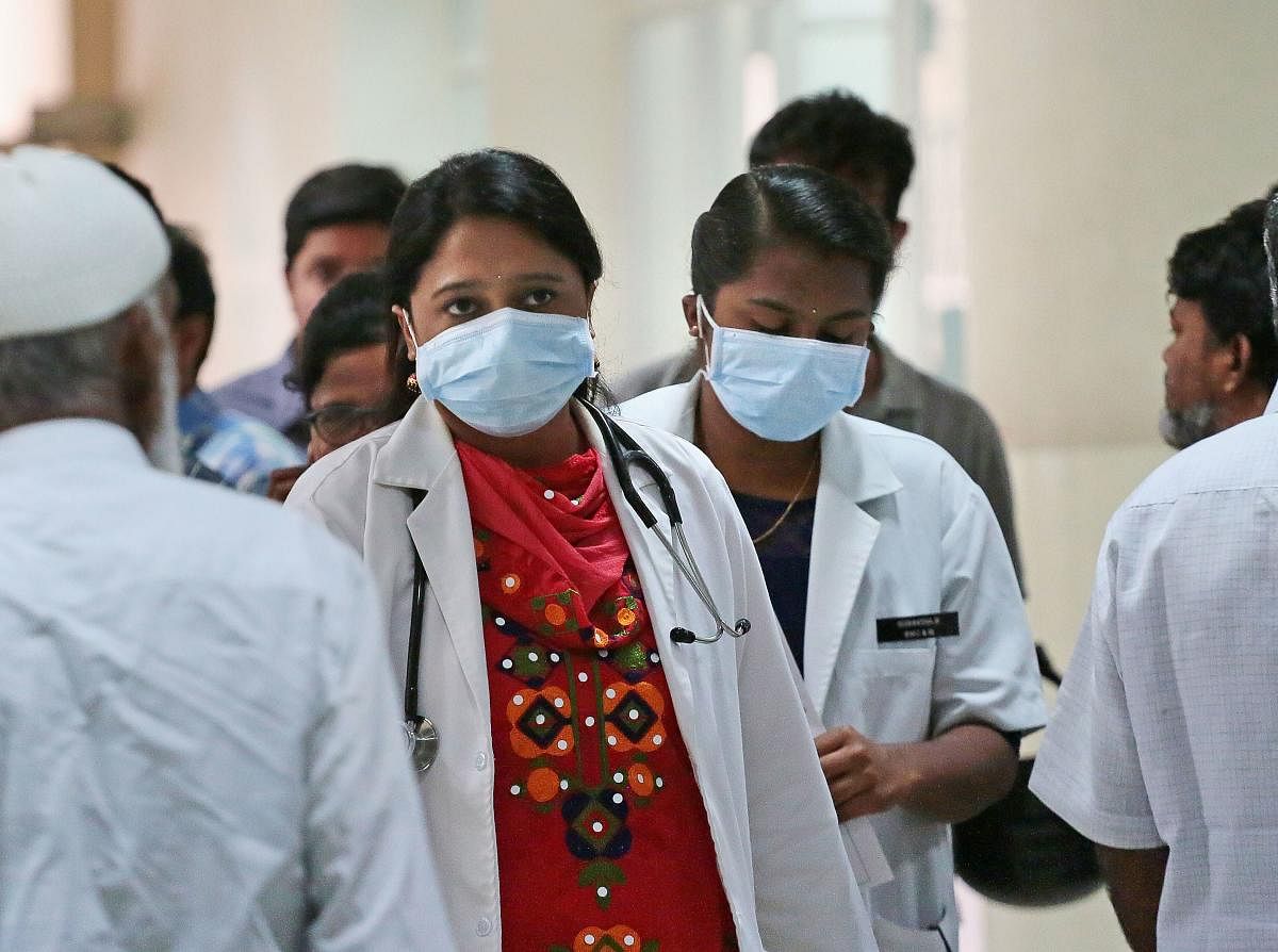  Medics wait to check people, who recently travelled from China, at the specially setup coronavirus ward at Rajiv Gandhi Institute of Chest Diseases, in Bengaluru, Friday, Jan. 31, 2020. Credit: PTI Photo