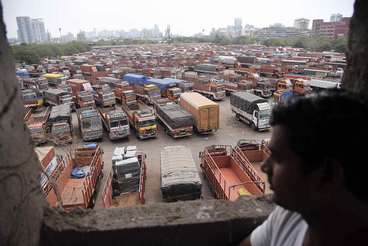 Trucks stand parked at APMC Truck Terminal, during the nationwide lockdown, in Mumbai. PTI/Representative image