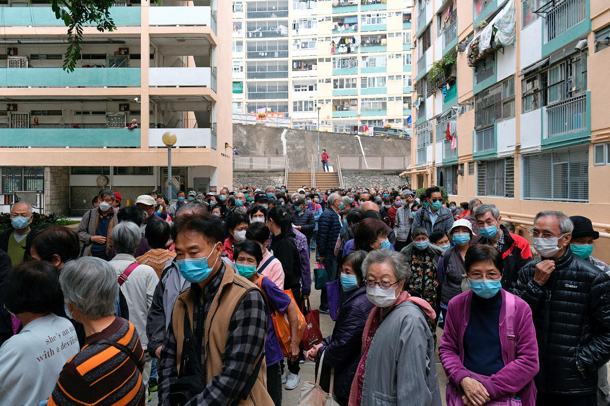 People wearing facemask following the outbreak of a new coronavirus (Reuters Photo)