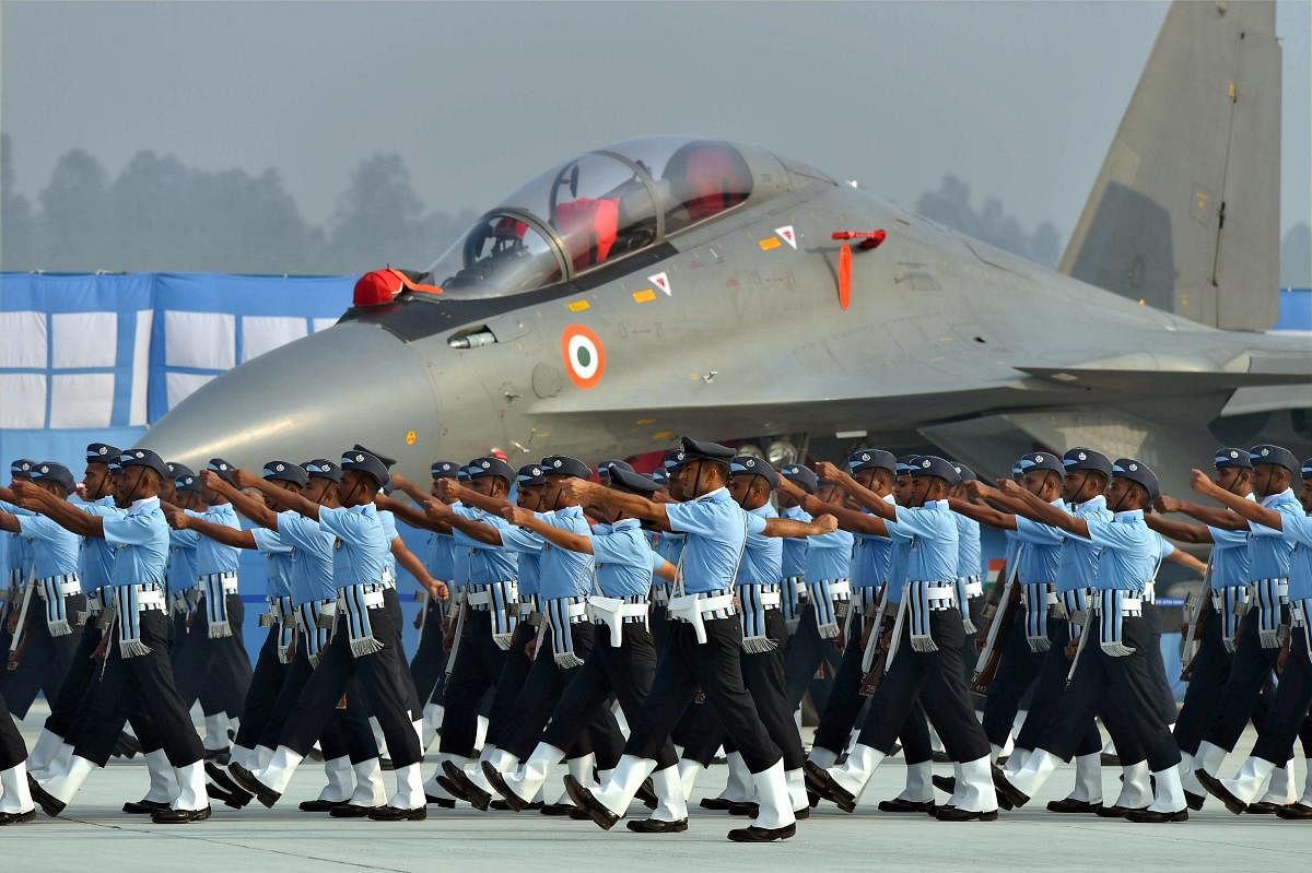 Ghaziabad: Indian Air Force personnel near Sukhoi-30 MKI fighter plane take part in parade on the 85th Air Force Day parade at Hindon Air Force base in Ghaziabad on Sunday. PTI Photo by Kamal Kishore (PTI10_8_2017_000031b)