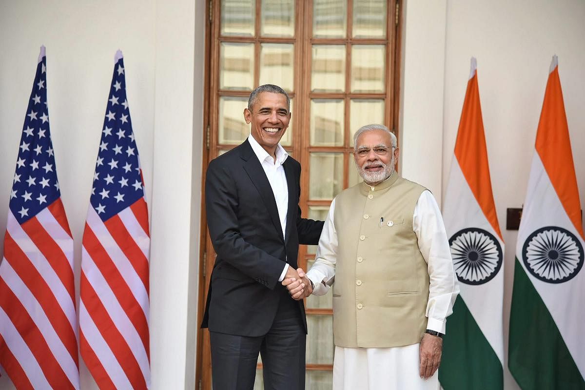 Prime Minister Narendra Modi meets former US President Barack Obama in New Delhi on December 1, 2017. PTI