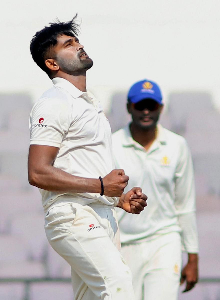 Vinay Kumar, Ganesh Satish and Amit Verma (from left) were the standout performers for their adopted state teams this season following their exit from Karnataka for various reasons at various points. DH File Photos