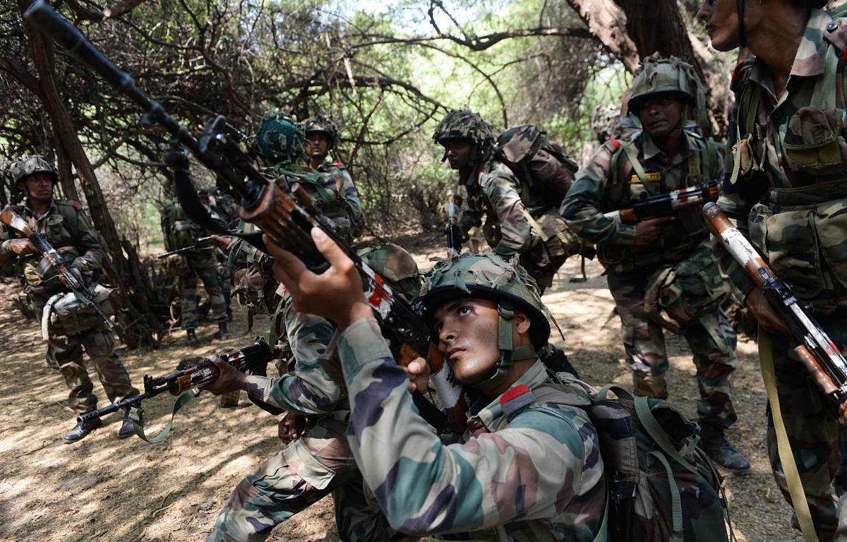 Indian army cadets take part in a Tactical Continuity Training' exercise at an Officers Training Academy (OTA) in Chennai. AFP