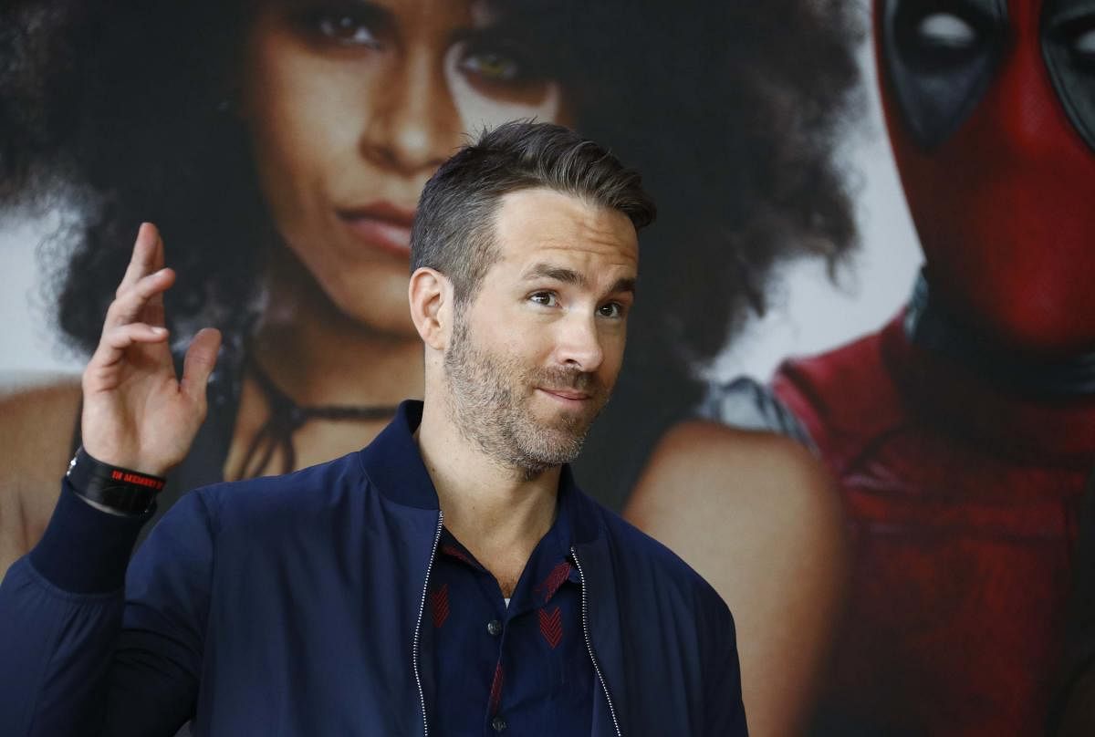 Actor and producer Ryan Reynolds poses for a picture during a photo call for the movie "Deadpool 2" ahead of the premiere in Berlin, Germany, May 11, 2018. Reuters