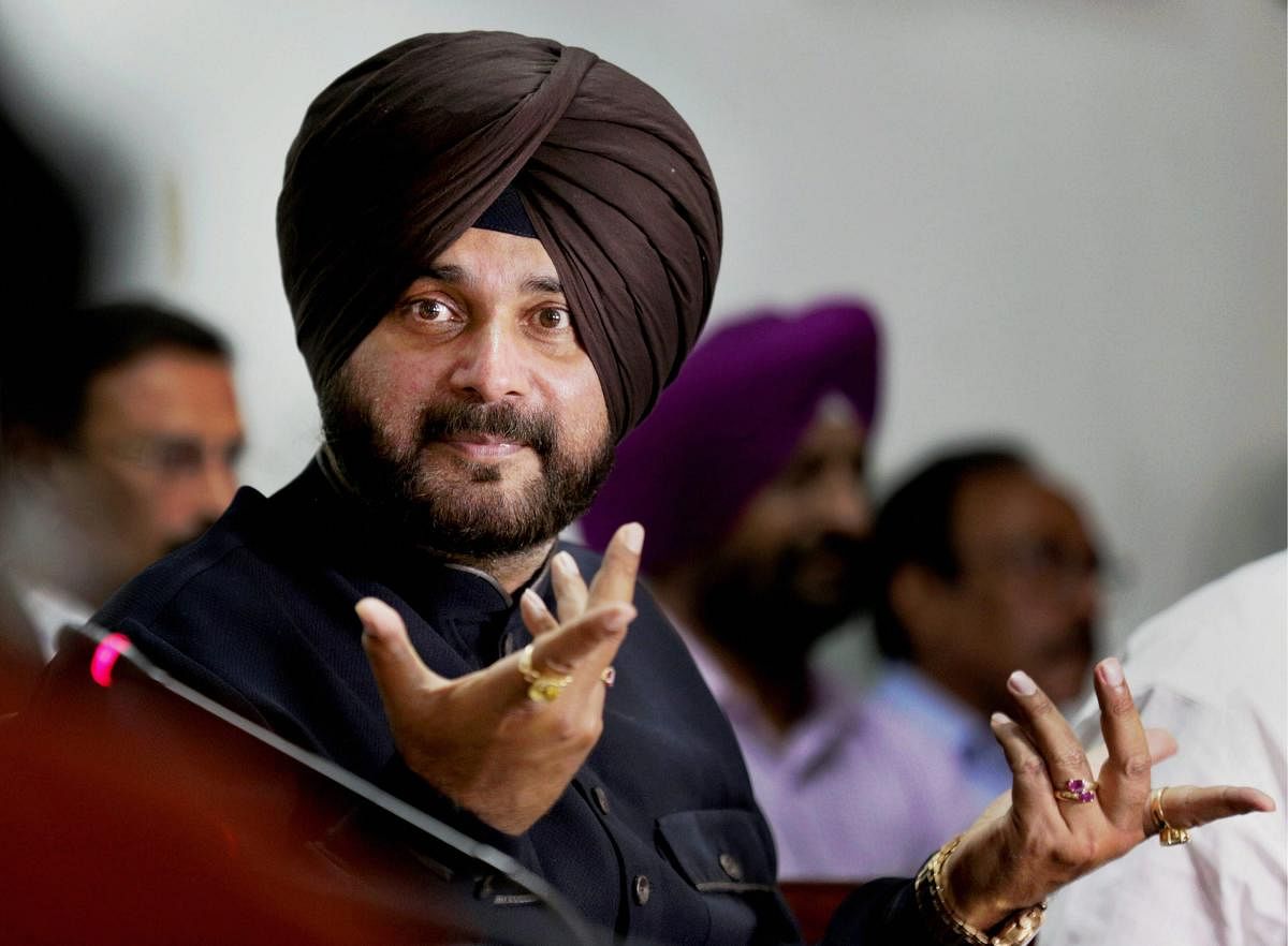 In this file photo dated Wednesday, May 02, 2018, Punjab Minister for Tourism &amp; Cultural Affairs Navjot Singh Sidhu is seen at a press conference in Amritsar. The Supreme Court on Tuesday convicted Sidhu for voluntarily causing hurt to a 65-year-old m