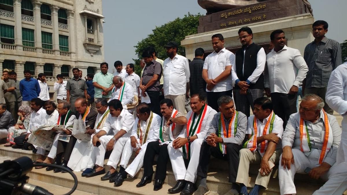 Congress leaders stage protest in front of Vidhana Soudha.