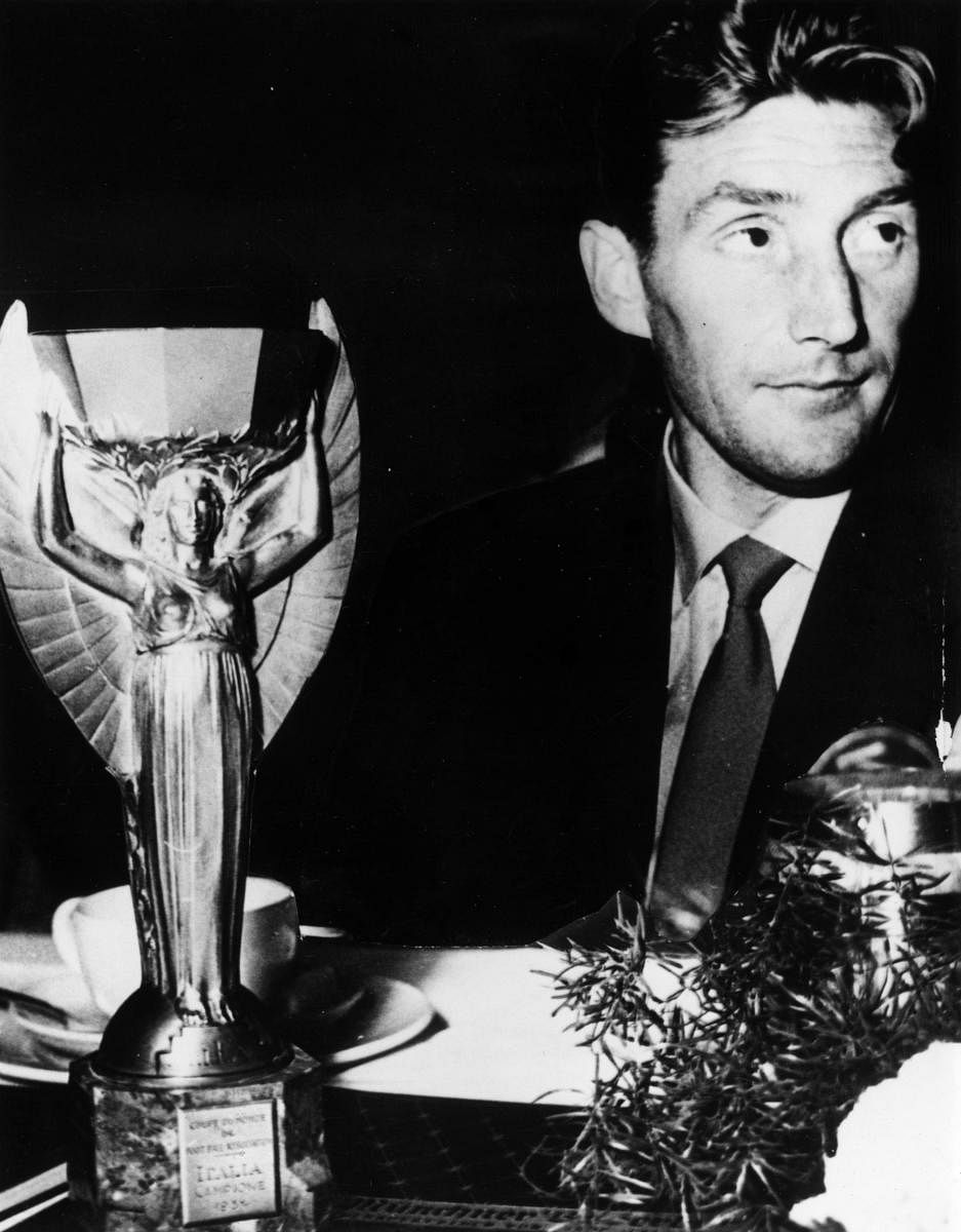 Germany's Fritz Walter with the Jules Rimet Trophy after his side beat Hungary in the 1954 final.