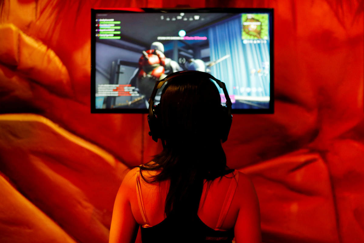 An attendee plays a video game at E3, the world's largest video game industry convention in Los Angeles, California, US. REUTERS Photo
