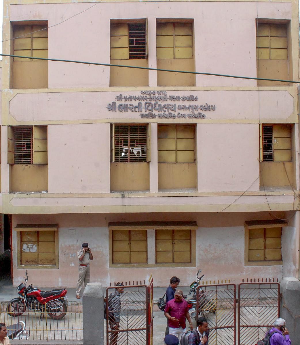 A view of Bharti School where Dev Bhagwandas Tadvi (14), a class IX student, was found with multiple stab wounds in the washroom, in Vadodara on Friday. PTI