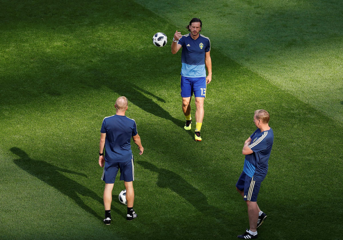 Sweden's Gustav Svensson during the warm up before the match, Reuters Photo