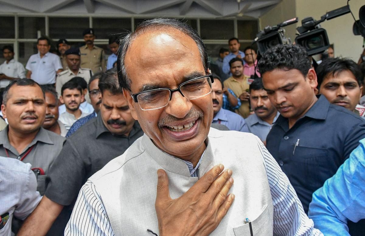 Bhopal: Madhya Pradesh Chief Minister Shivraj Singh Chouhan comes out after appearing in the District Court in connectin with K K Mishra defamation case, in Bhopal on Saturday, July 7, 2018. (PTI Photo) (PTI7_7_2018_000059B)