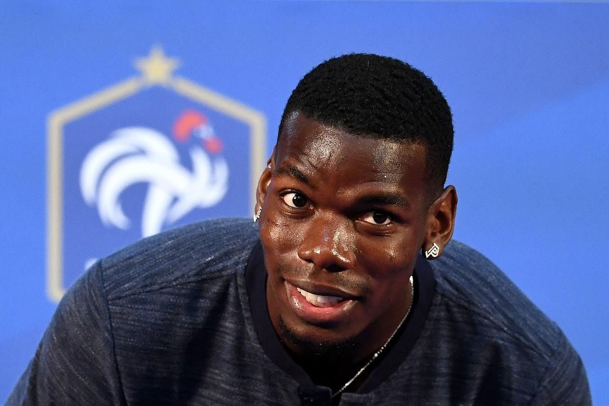 French midfielder Paul Pogba addresses a press conference on Thursday. AFP